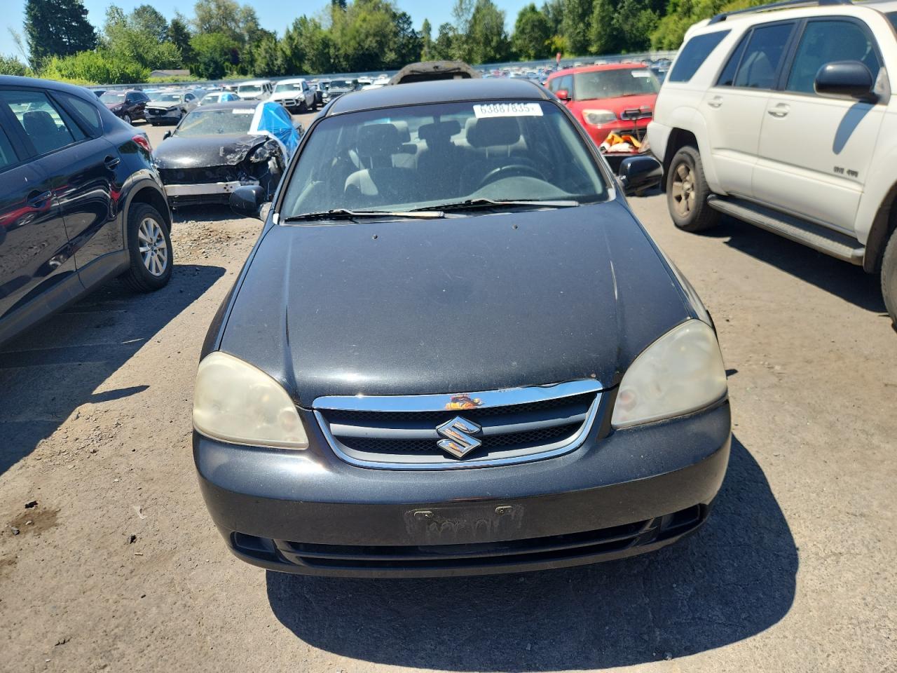 2006 Suzuki Forenza Black vin: KL5JD56Z56K409111