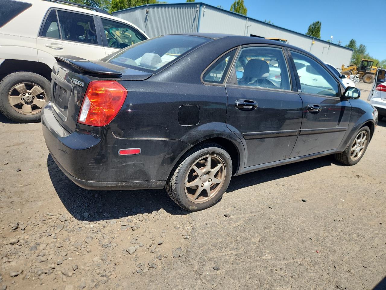 2006 Suzuki Forenza Black vin: KL5JD56Z56K409111