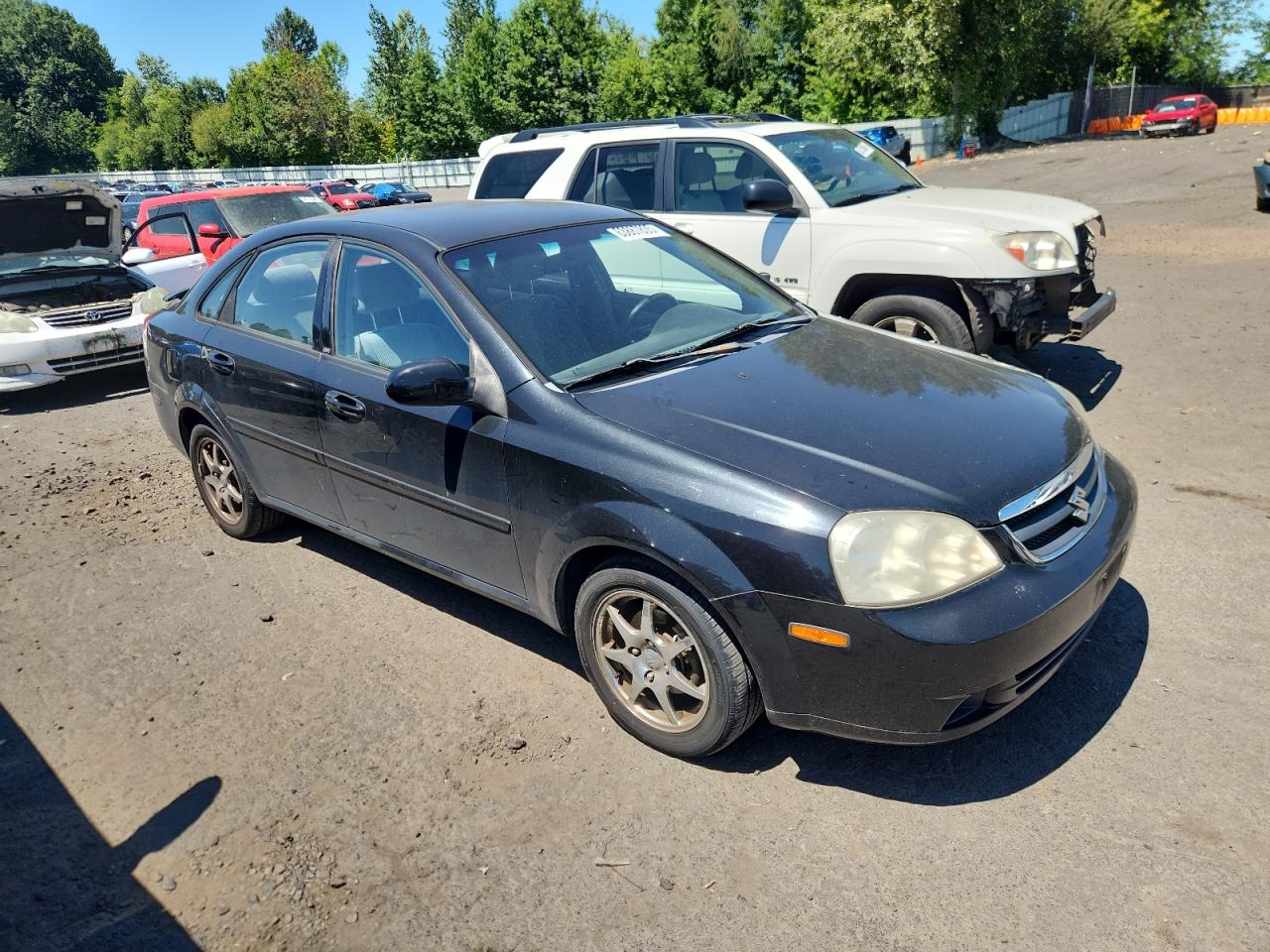 2006 Suzuki Forenza Black vin: KL5JD56Z56K409111