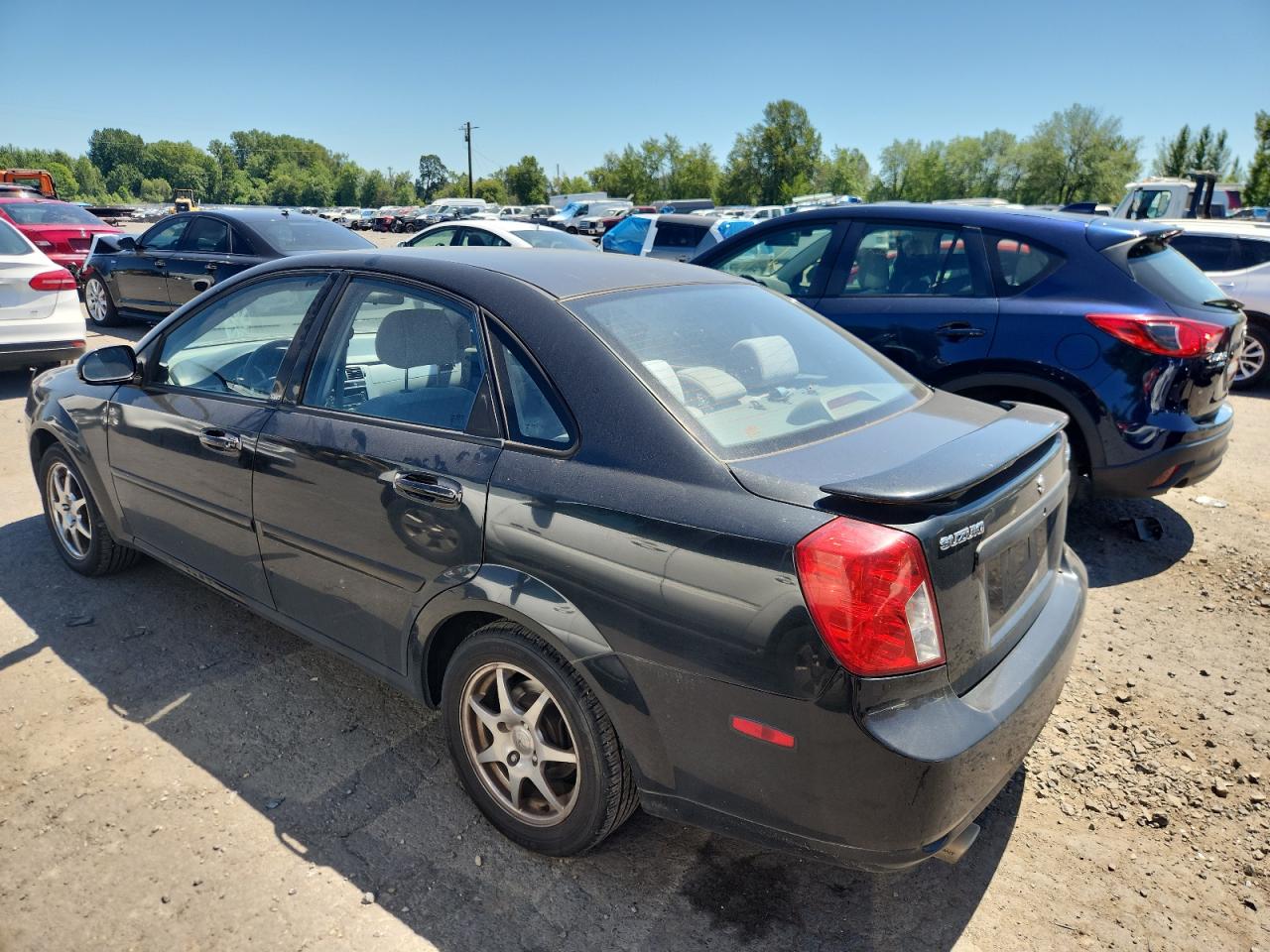 2006 Suzuki Forenza Black vin: KL5JD56Z56K409111