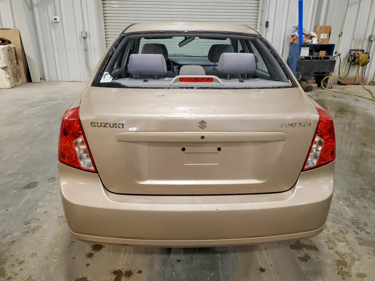 2006 Suzuki Forenza Tan vin: KL5JD56Z66K328022