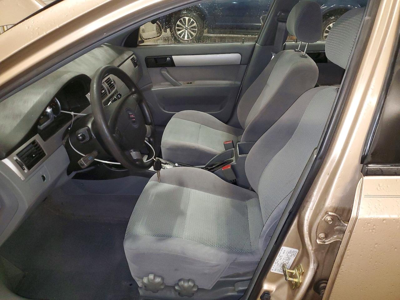 2006 Suzuki Forenza Tan vin: KL5JD56Z66K328022