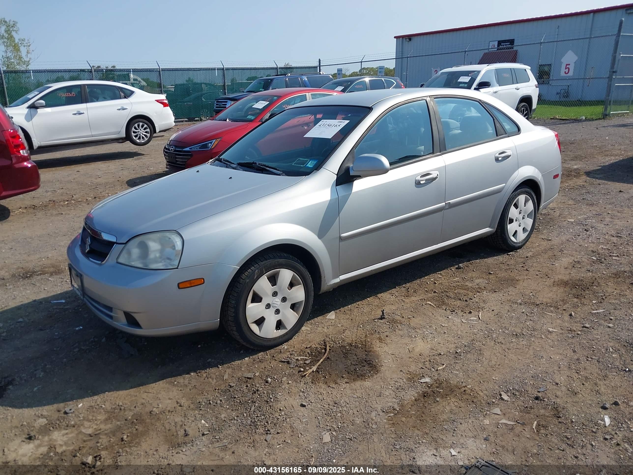 2006 Suzuki Forenza   Silver vin: KL5JD56ZX6K401022