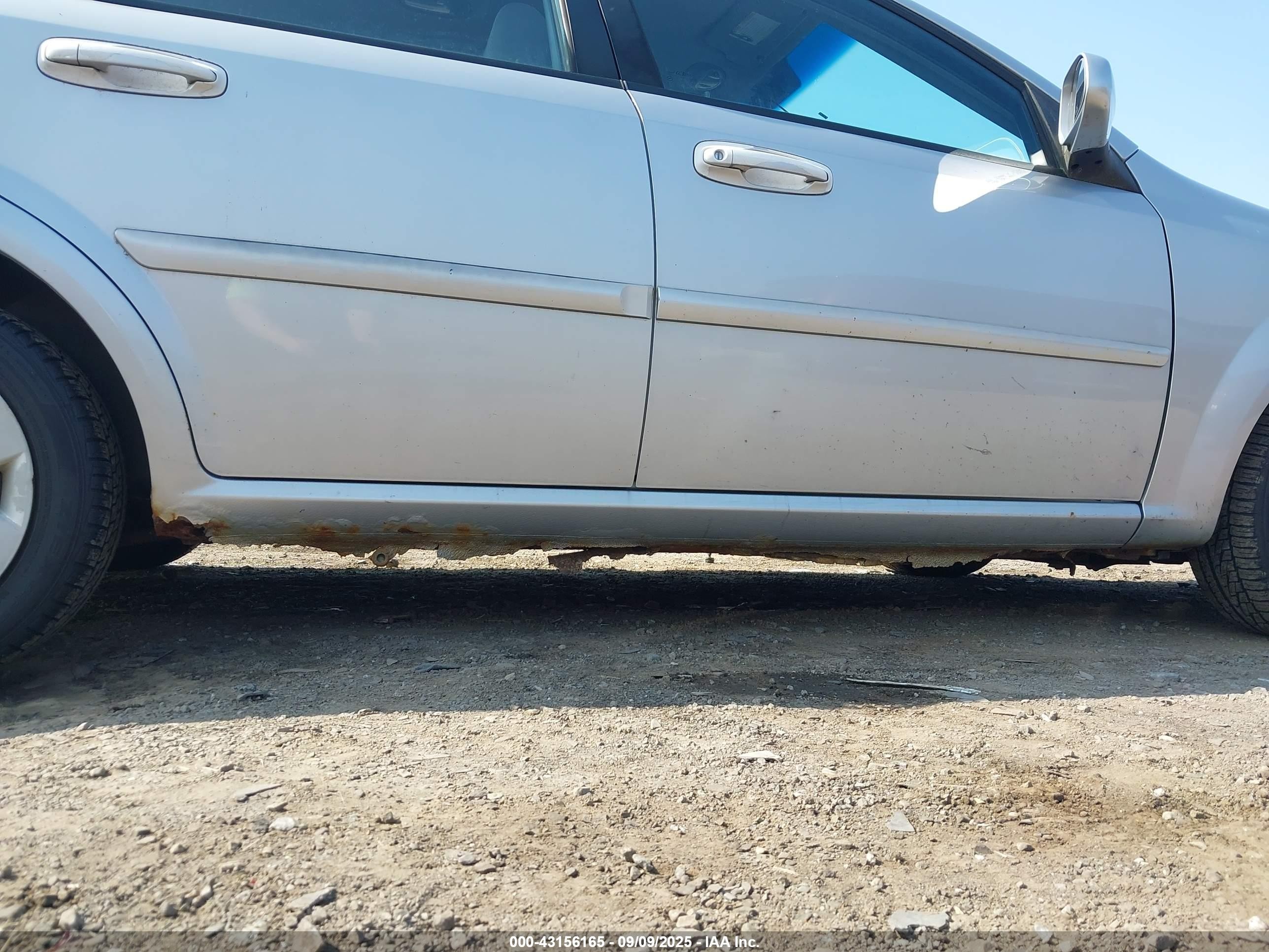 2006 Suzuki Forenza   Silver vin: KL5JD56ZX6K401022