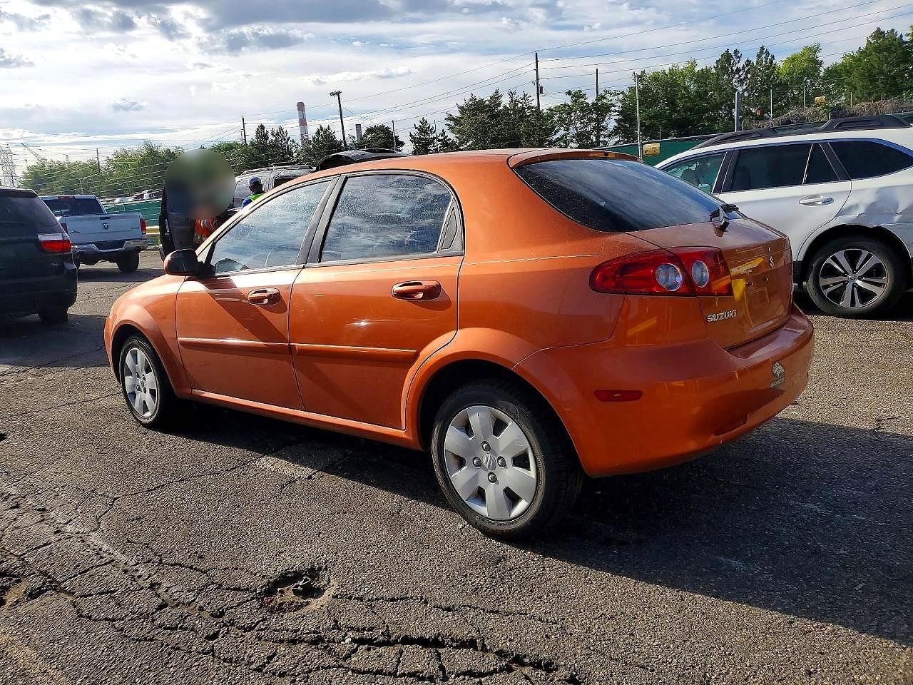 2007 Suzuki Reno Base Orange vin: KL5JD66Z47K556205