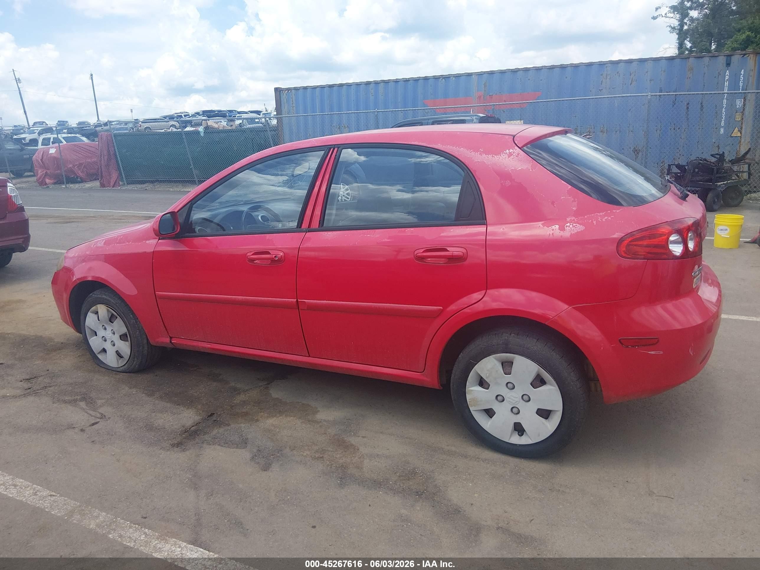 2006 Suzuki Reno Convenience Red vin: KL5JD66ZX6K434530