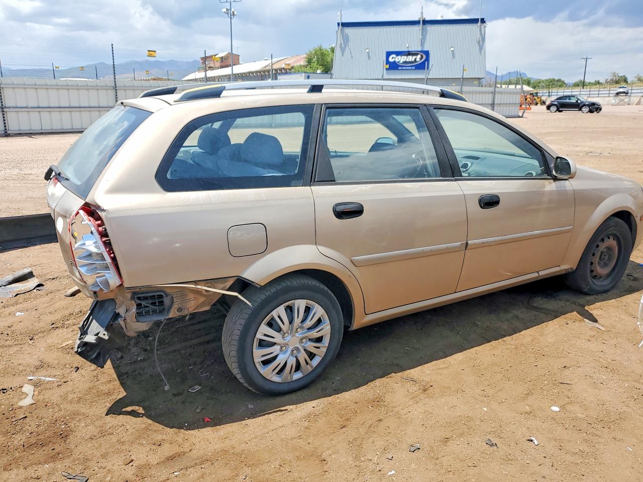 2005 Suzuki Forenza 4d Beige vin: KL5JD86Z35K128974