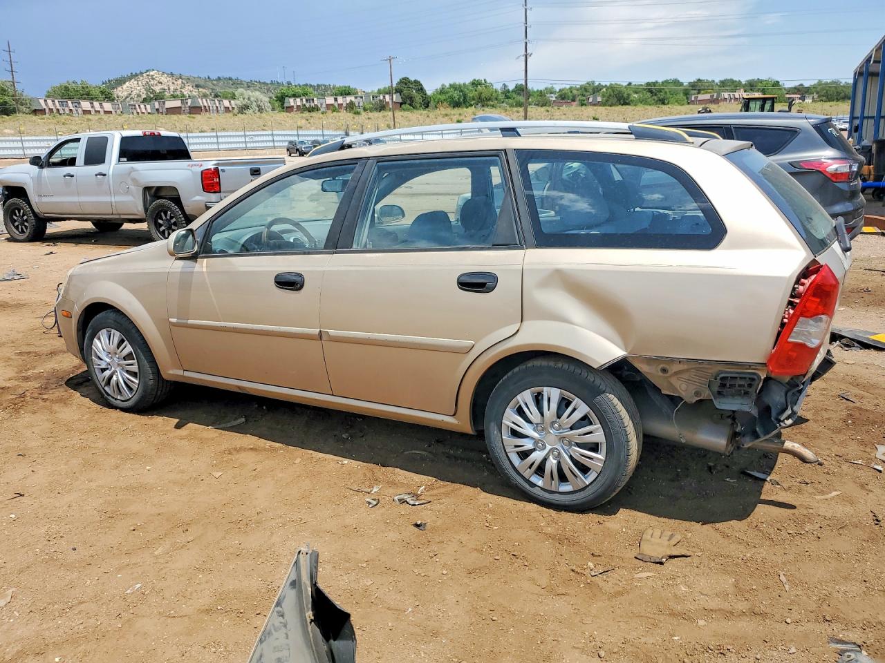 2005 Suzuki Forenza 4d Beige vin: KL5JD86Z35K128974