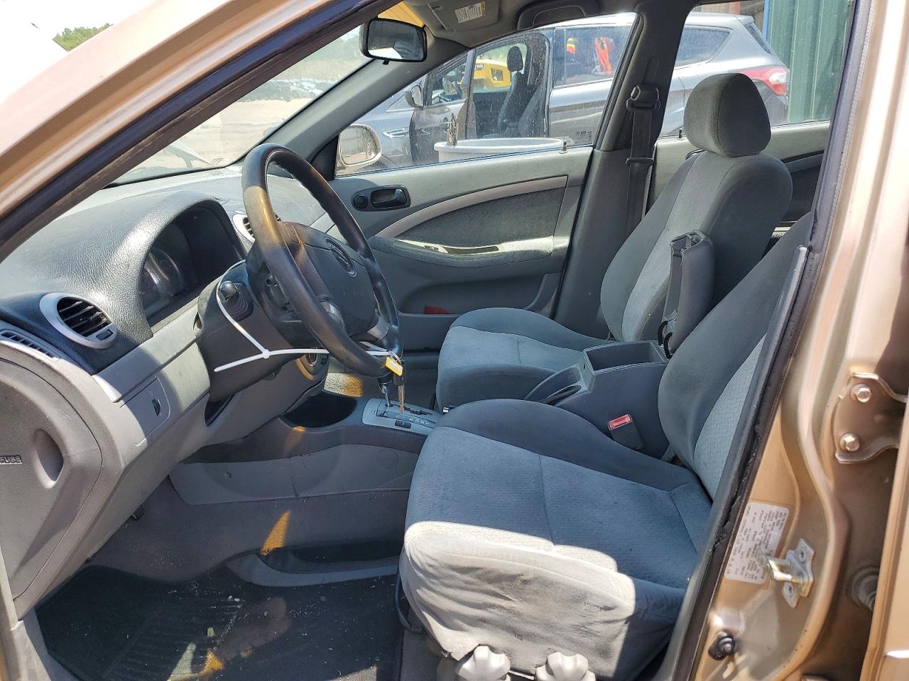 2005 Suzuki Forenza 4d Beige vin: KL5JD86Z35K128974