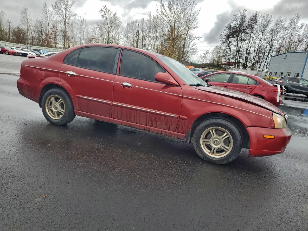 2005 Suzuki Verona S Red vin: KL5VJ56L65B155039
