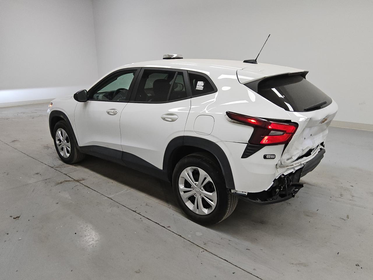 2025 Chevrolet Trax Ls White vin: KL77LFEP8SC170703 Damage: Left Tail Light, Broken, Replacement Required