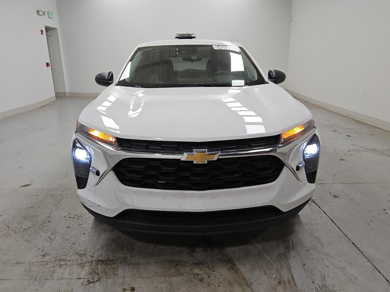 2025 Chevrolet Trax Ls White vin: KL77LFEP8SC170703 Damage: Front Bumper/Cover, Scraped, 7 To 8 Inches