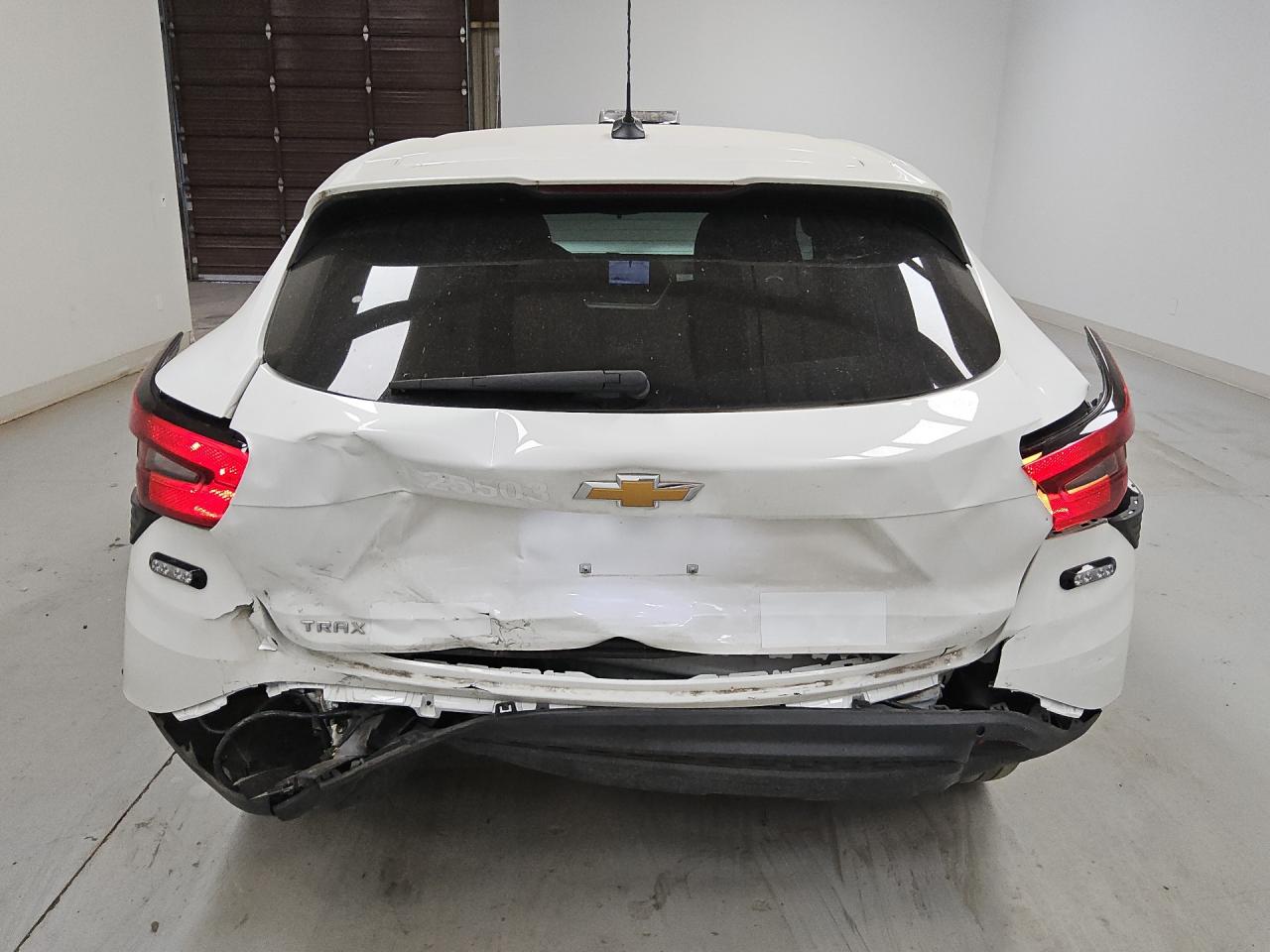 2025 Chevrolet Trax Ls White vin: KL77LFEP8SC170703 Damage: Left Rear Marker Lamp, Aftermarket, Acceptable