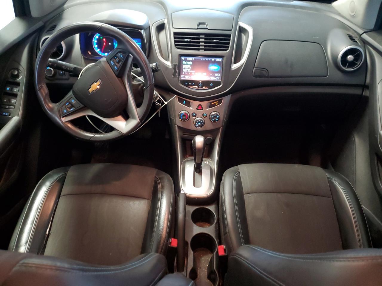 2015 Chevrolet Trax 1lt Brown vin: KL7CJLSB7FB221311 Damage: Left Front Seat Cushion, Torn, > 12 Inches