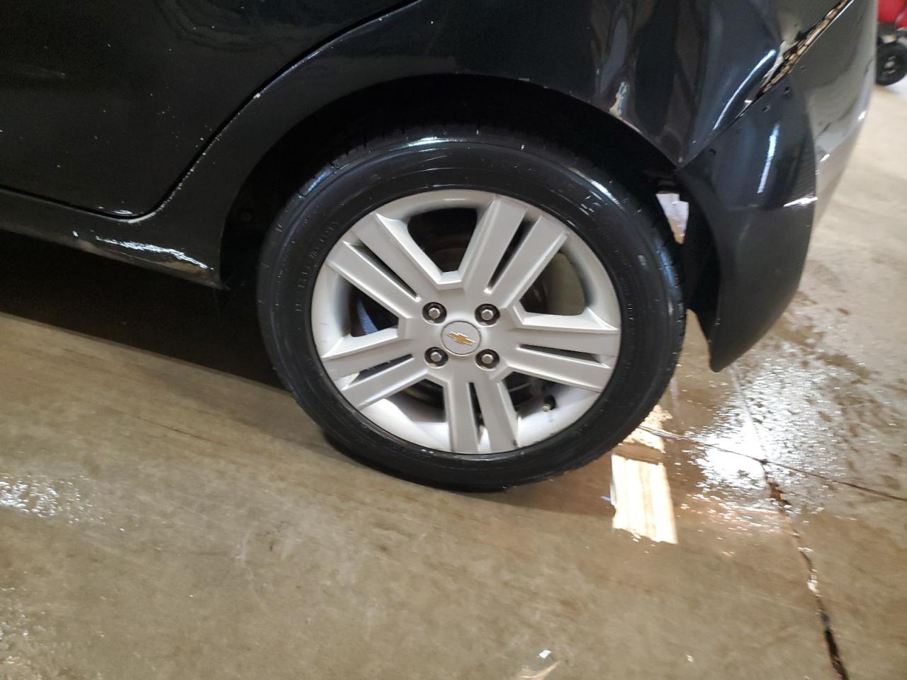 2013 Chevrolet Spark 1lt Black vin: KL8CD6S91DC580100 Damage: Left Rear Wheel, Curb Rash, > 12 Inches