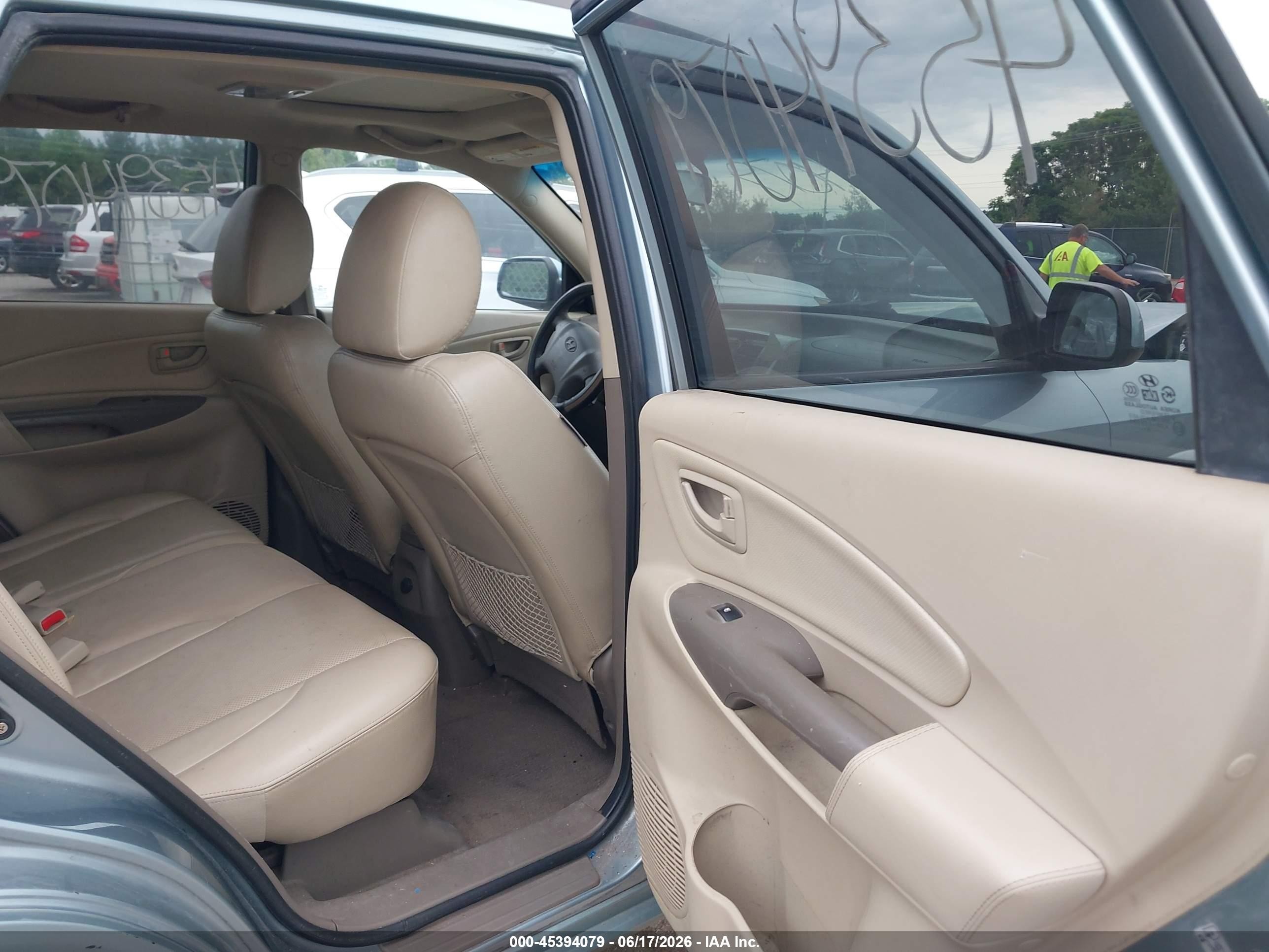 2009 Hyundai Tucson Limited V6 Light Blue vin: KM8JN12D49U948012