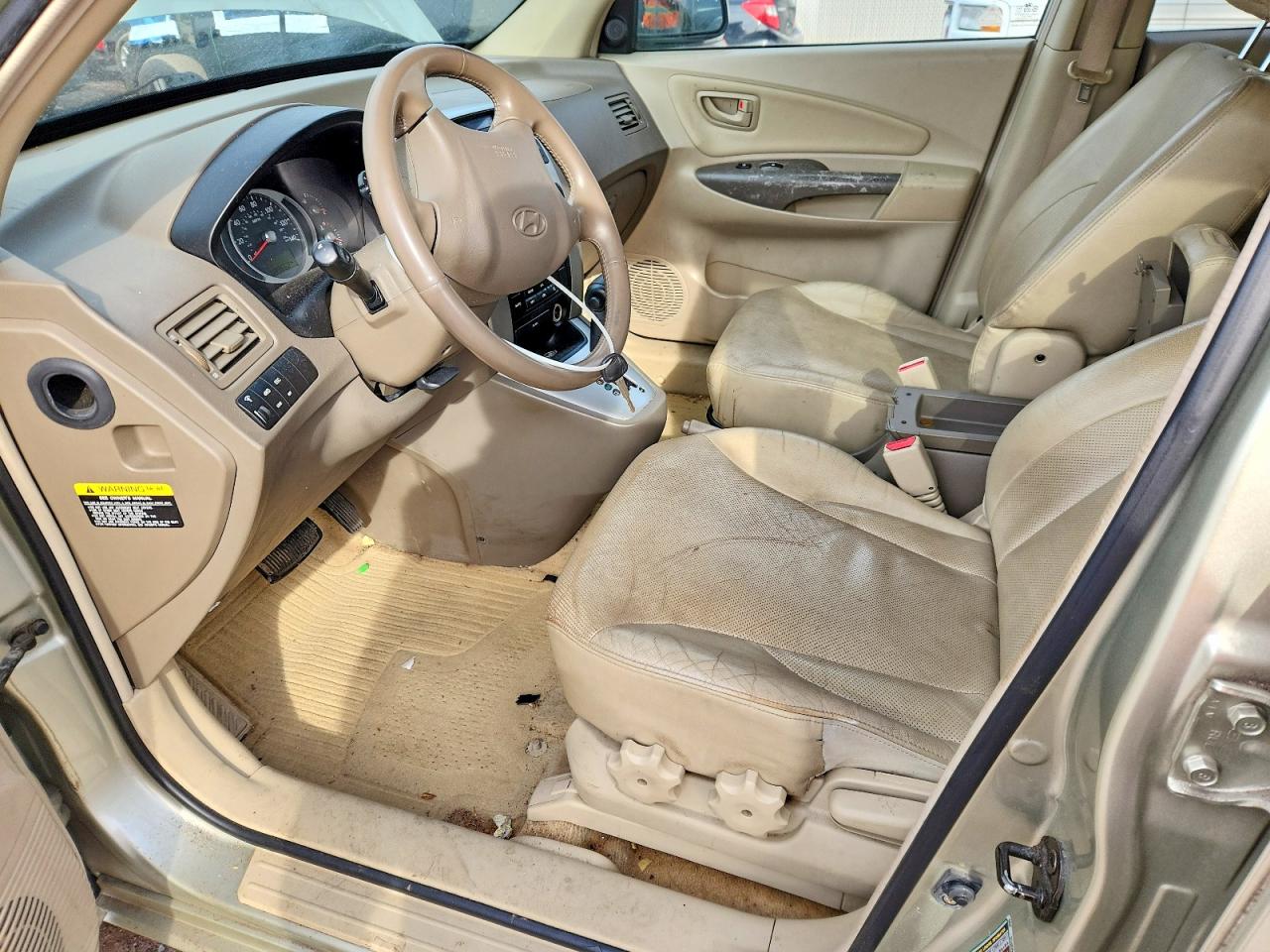 2006 Hyundai Tucson Золотой vin: KM8JN72D16U291281