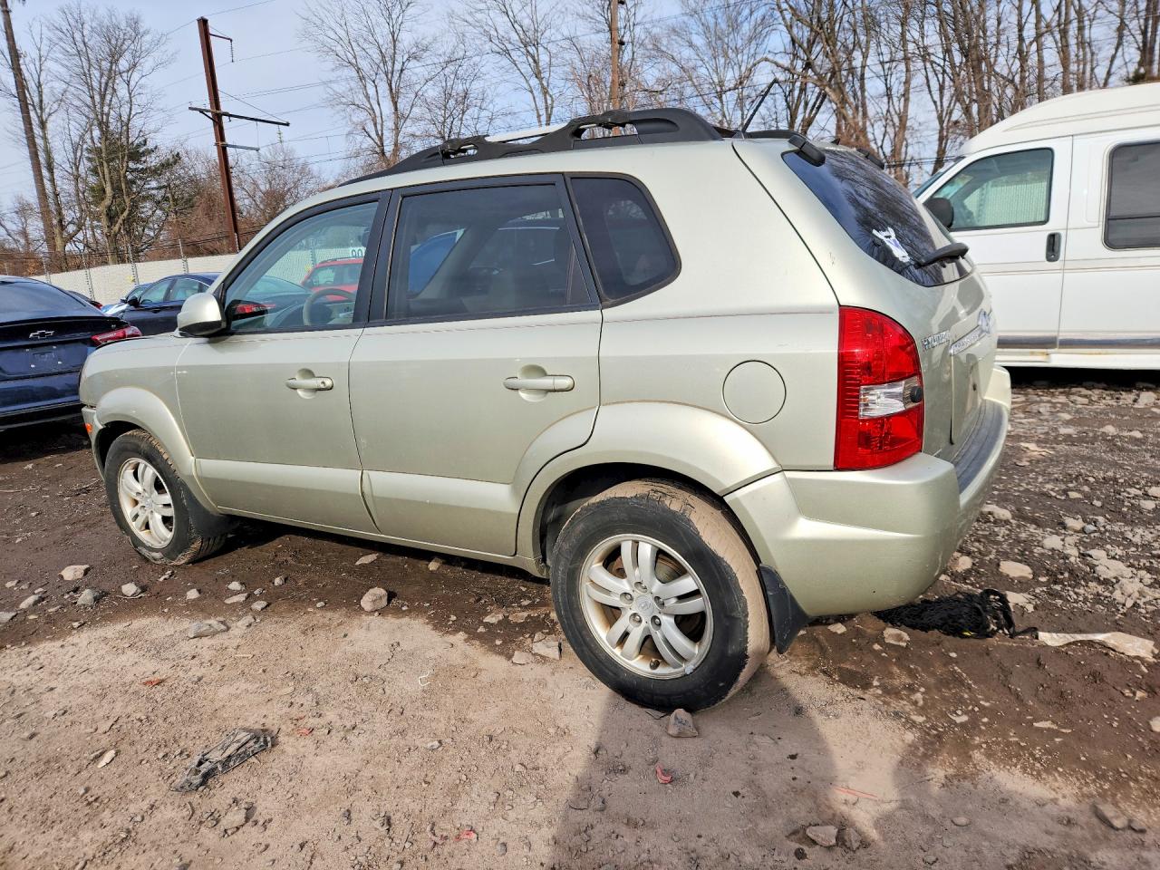 2006 Hyundai Tucson Золотой vin: KM8JN72D16U291281