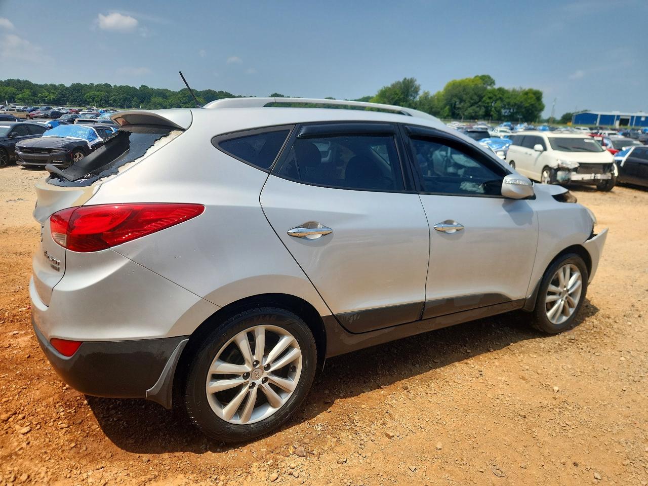 2012 Hyundai Tucson Limited Silver vin: KM8JU3AC2CU511821