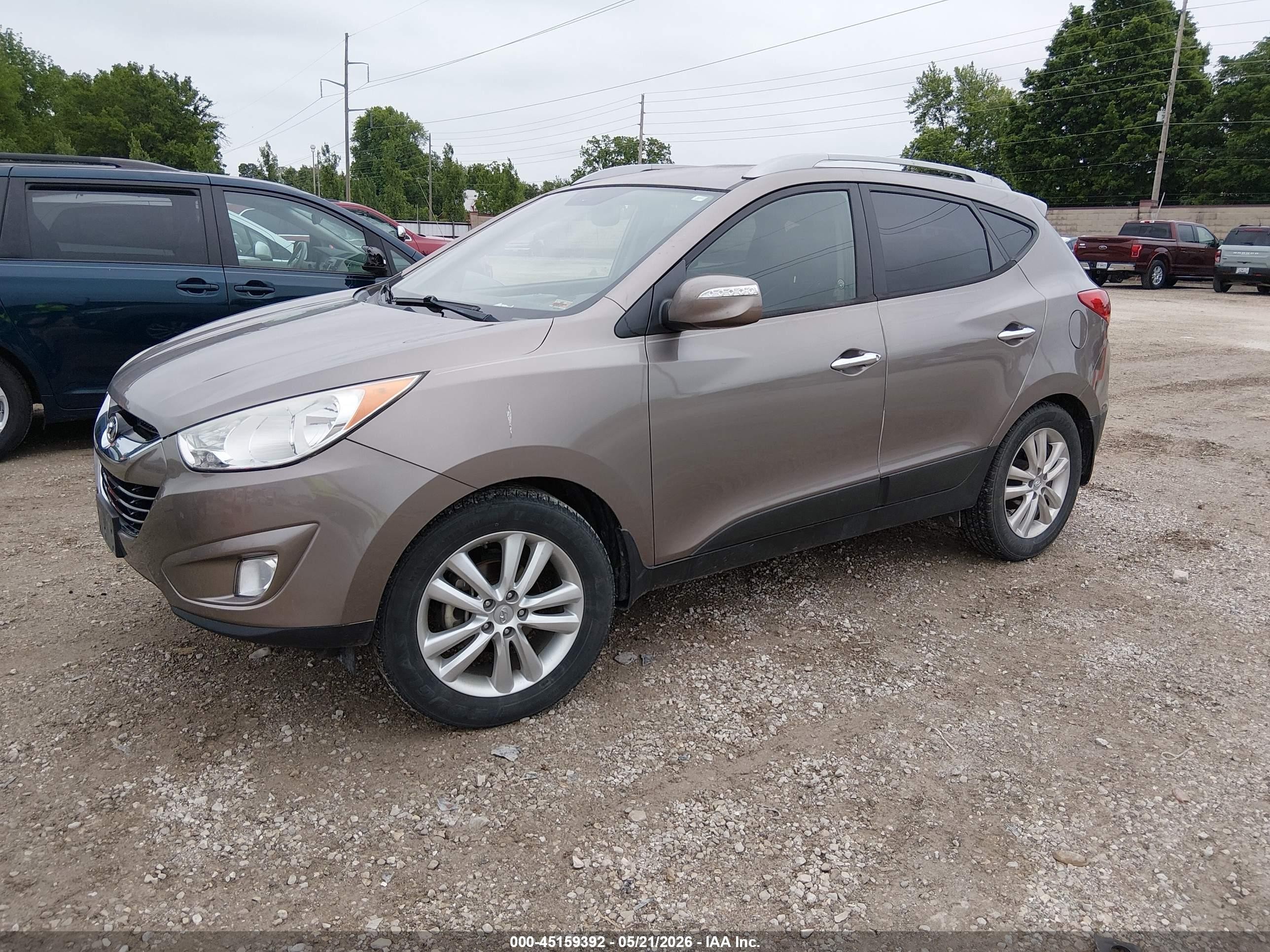 2011 Hyundai Tucson Limited Gold vin: KM8JU3AC3BU297713