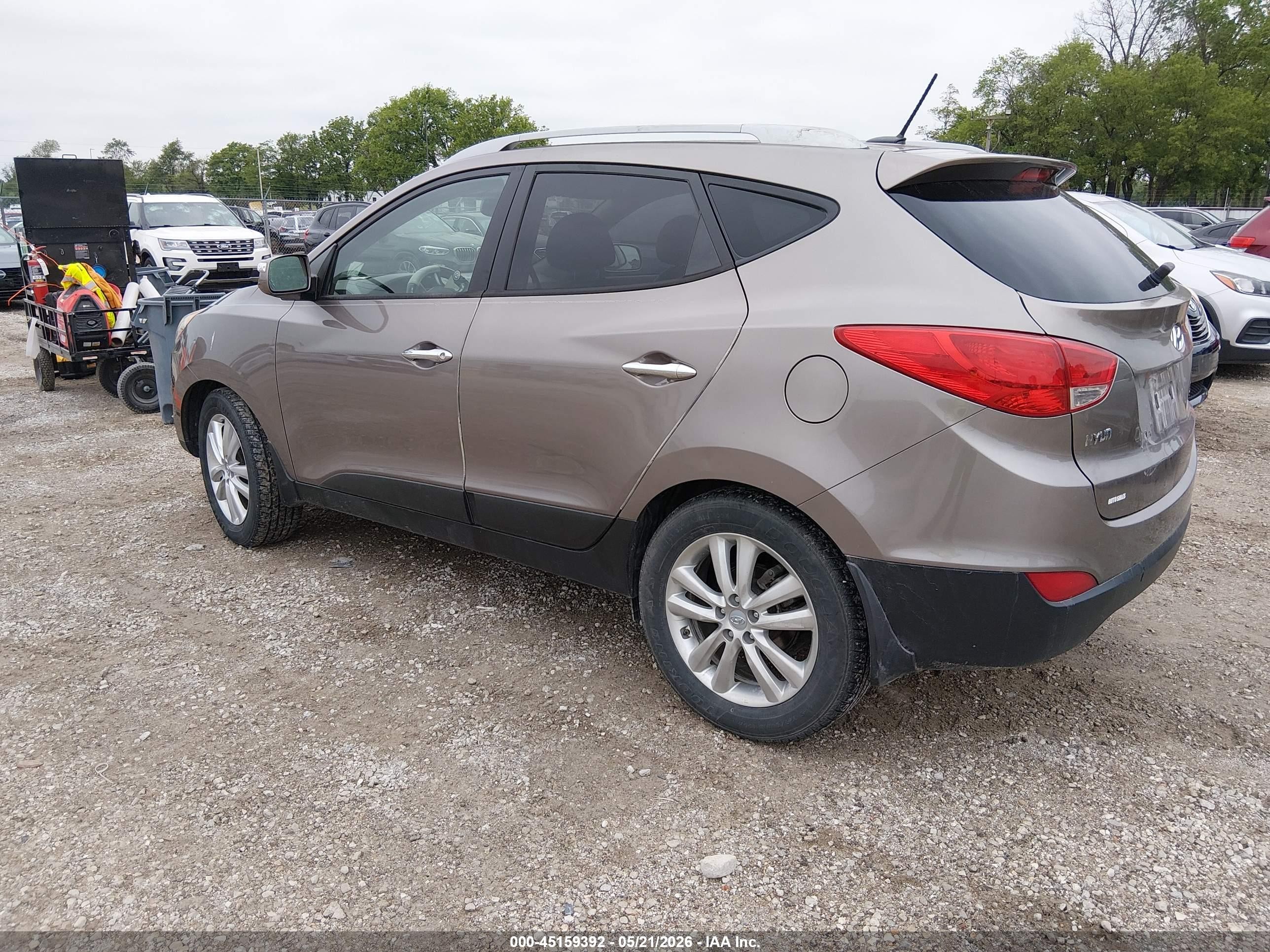 2011 Hyundai Tucson Limited Gold vin: KM8JU3AC3BU297713