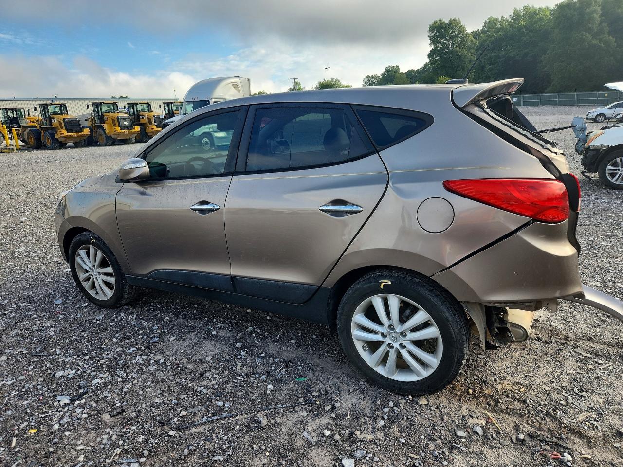 2011 Hyundai Tucson Limited Желто-коричневый vin: KM8JU3AC4BU153765