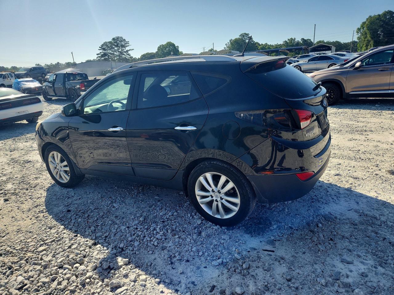 2011 Hyundai Tucson Limited Black vin: KM8JU3AC4BU169125