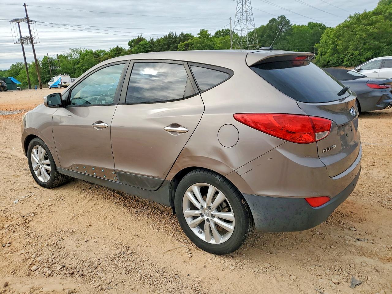 2011 Hyundai Tucson Limited Коричневый vin: KM8JU3AC4BU197992