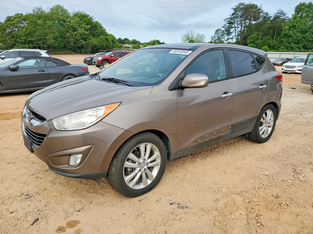2011 Hyundai Tucson Limited Коричневый vin: KM8JU3AC4BU197992