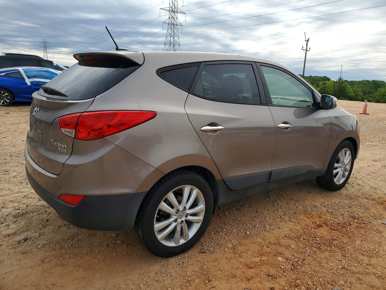 2011 Hyundai Tucson Limited Коричневый vin: KM8JU3AC4BU197992