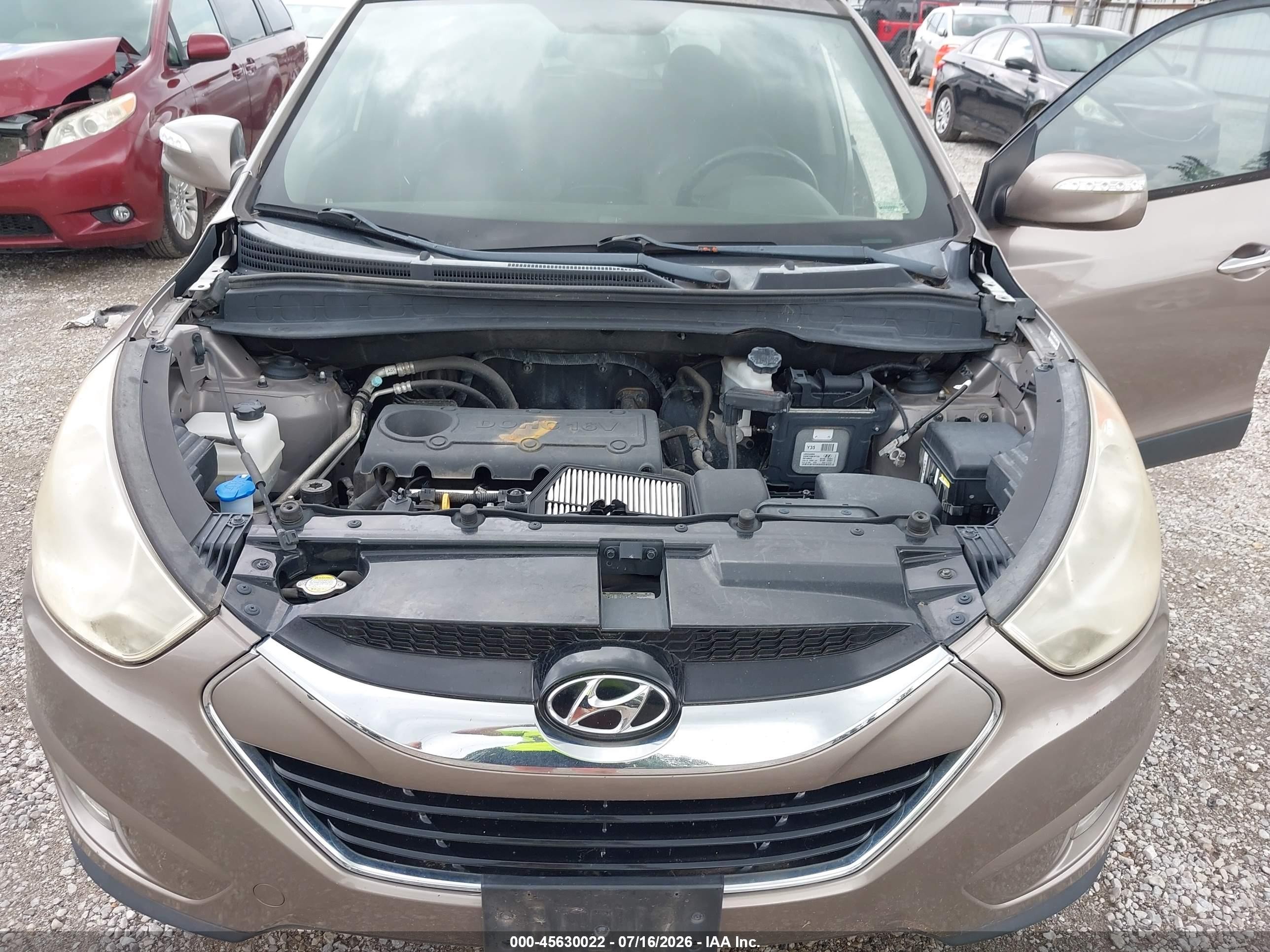 2011 Hyundai Tucson Limited Золотой vin: KM8JU3AC4BU221742