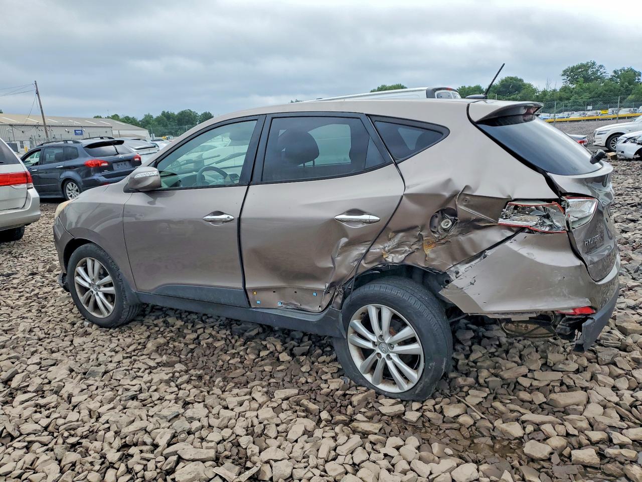 2012 Hyundai Tucson Limited Tan vin: KM8JU3AC5CU523686