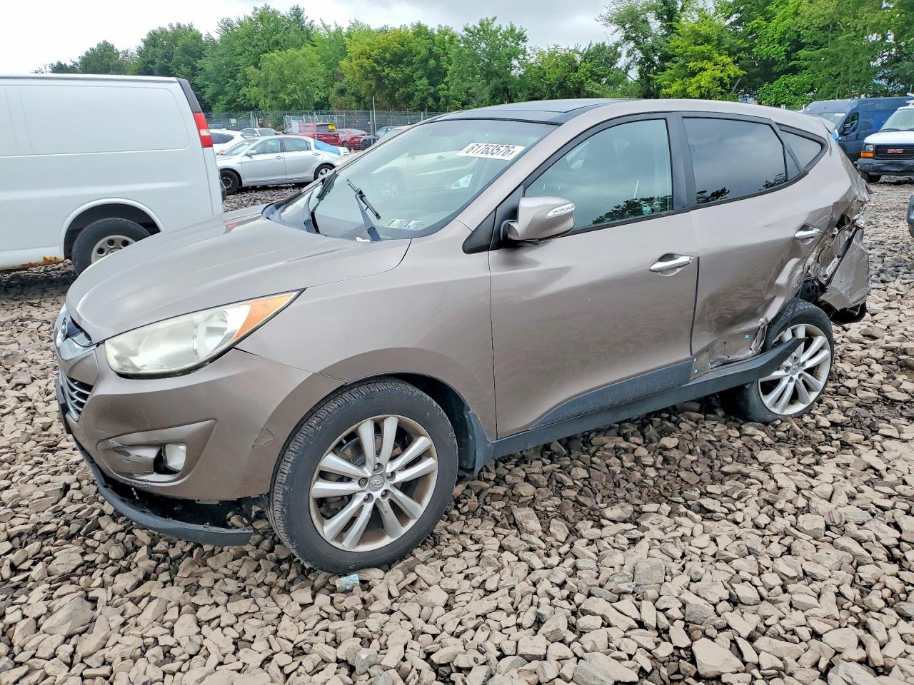 2012 Hyundai Tucson Limited Tan vin: KM8JU3AC5CU523686