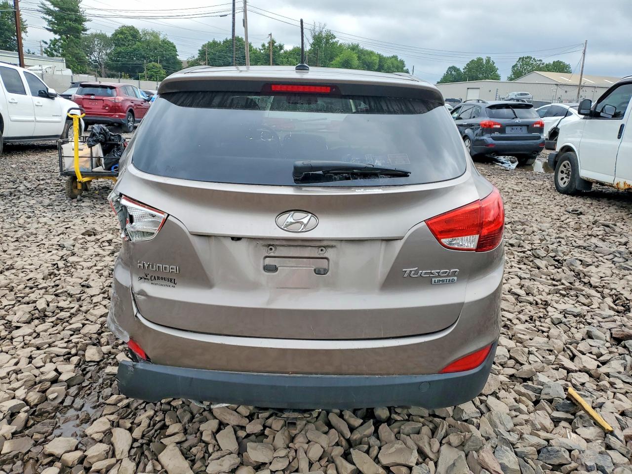 2012 Hyundai Tucson Limited Tan vin: KM8JU3AC5CU523686