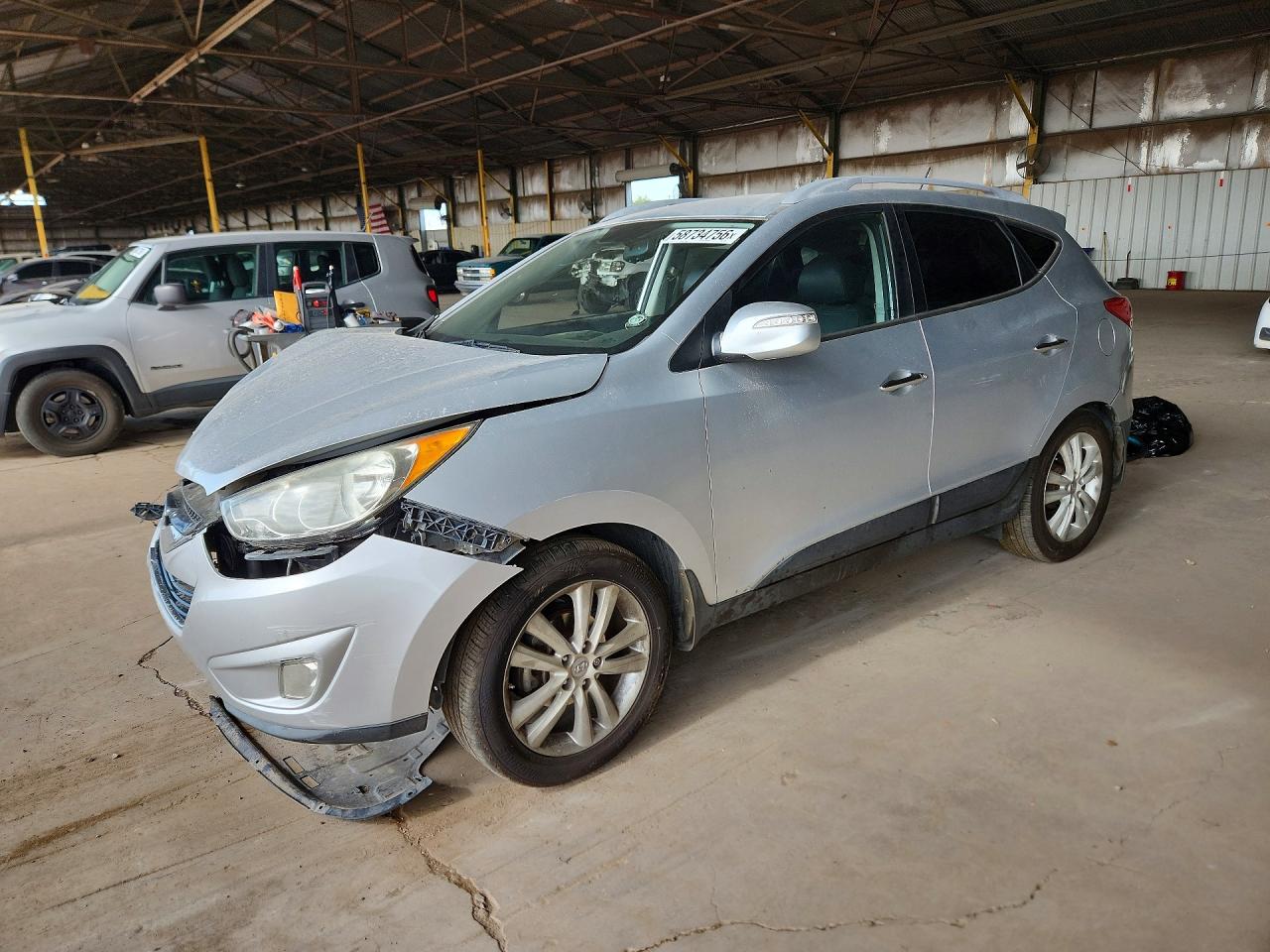 2011 Hyundai Tucson Limited Silver vin: KM8JU3AC7BU132134