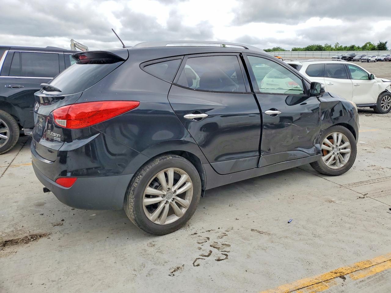 2012 Hyundai Tucson Черный vin: KM8JU3AC7CU354058