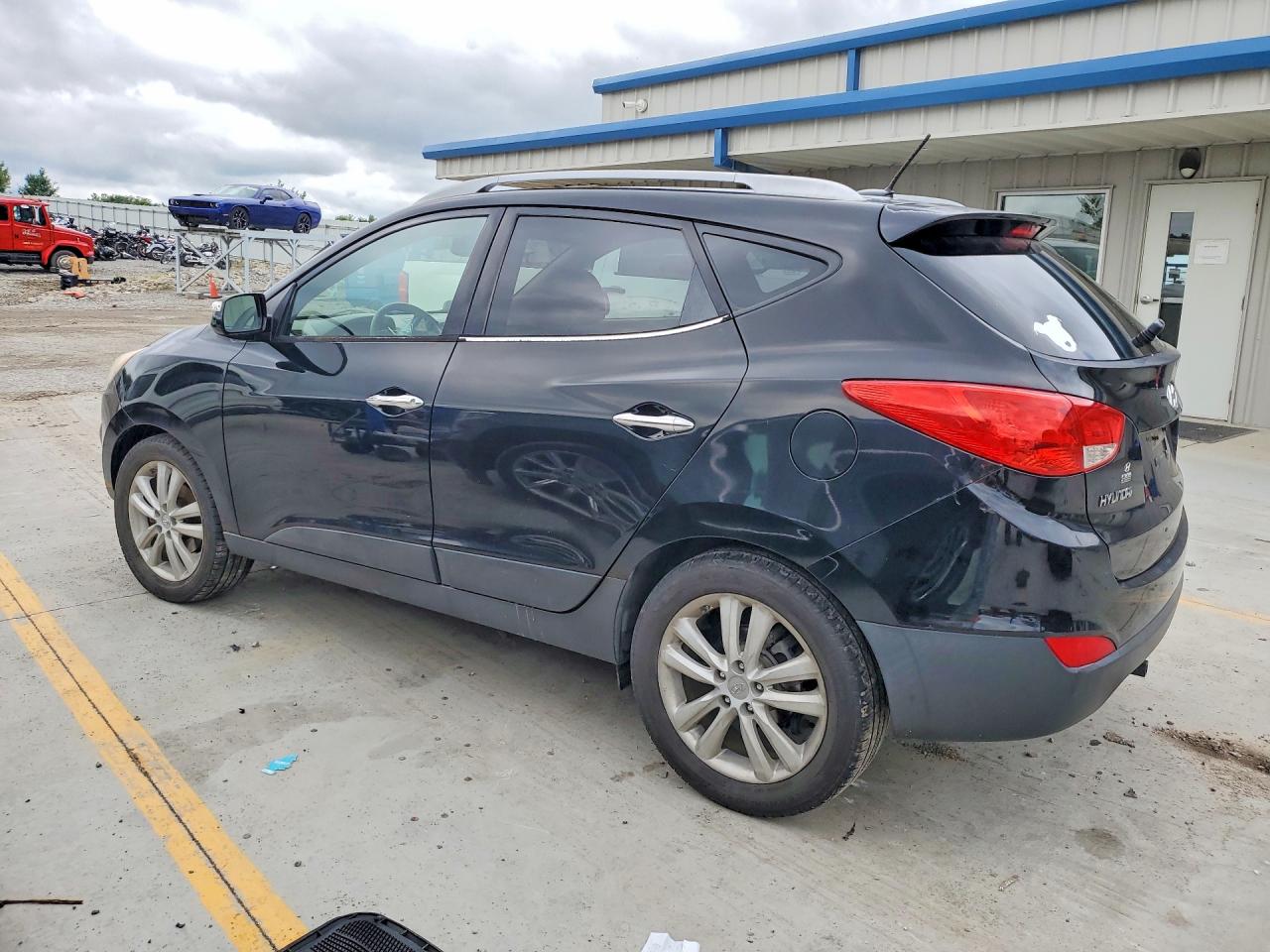 2012 Hyundai Tucson Черный vin: KM8JU3AC7CU354058