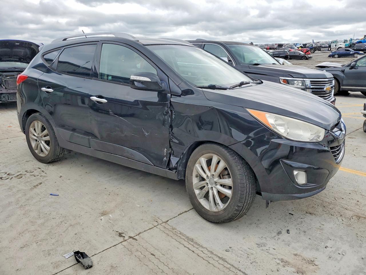 2012 Hyundai Tucson Черный vin: KM8JU3AC7CU354058