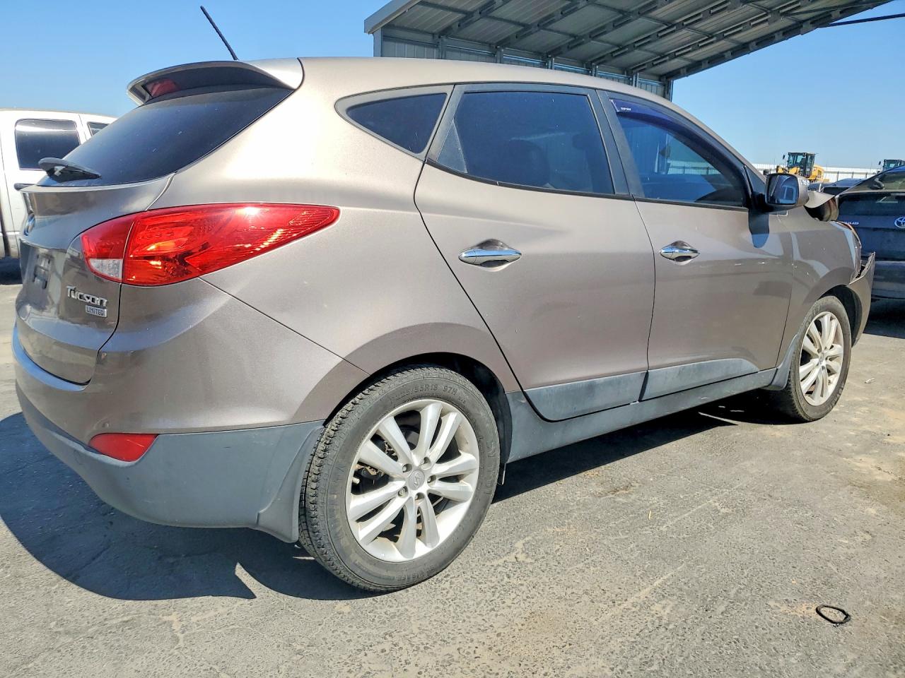 2013 Hyundai Tucson Limited Tan vin: KM8JU3AC7DU695705