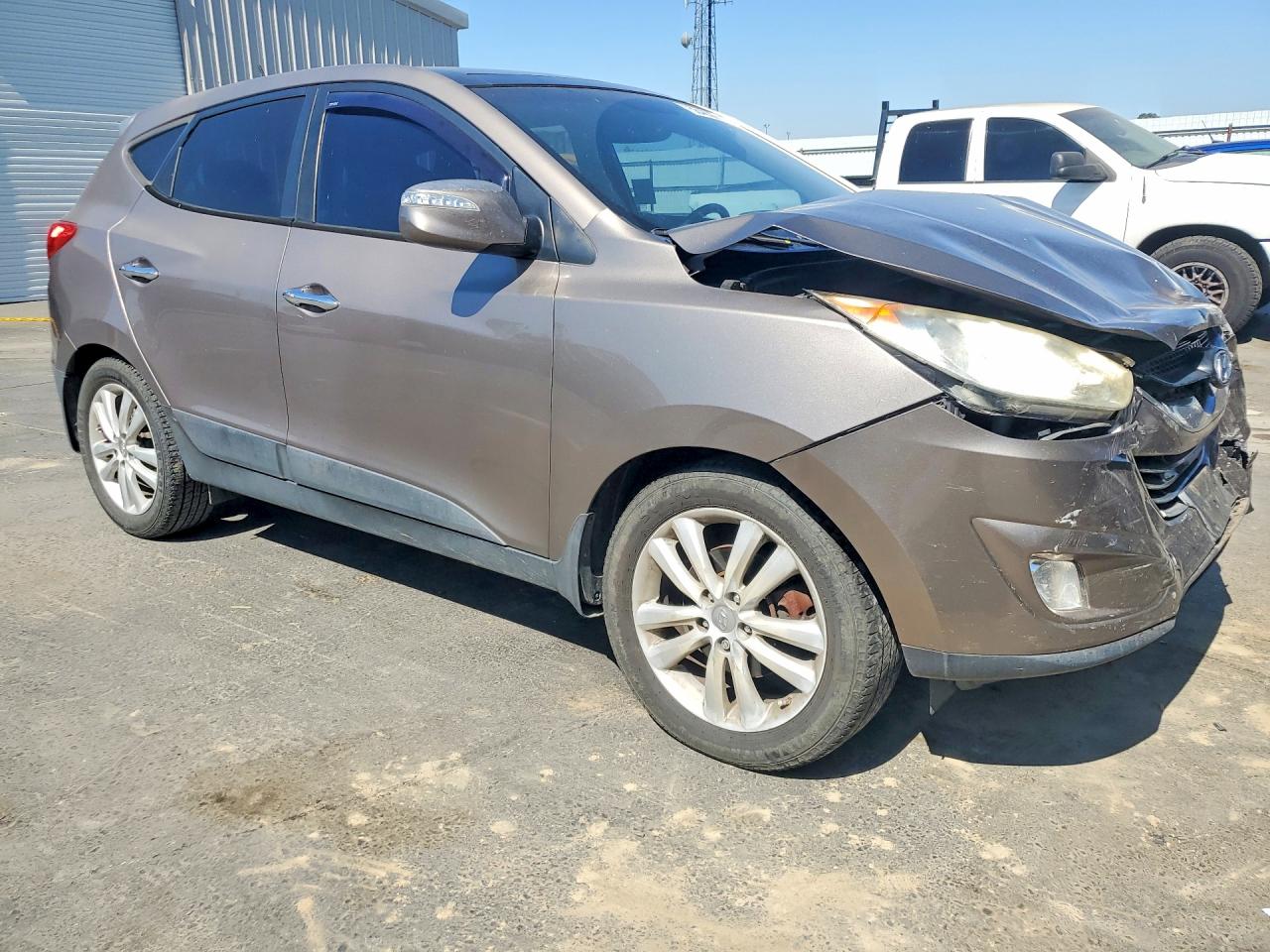 2013 Hyundai Tucson Limited Tan vin: KM8JU3AC7DU695705