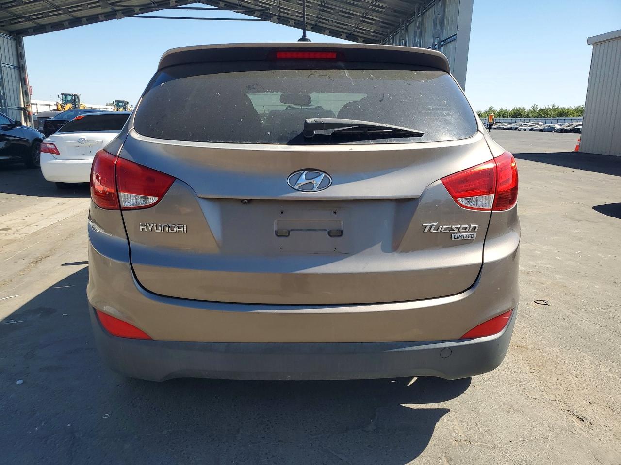 2013 Hyundai Tucson Limited Tan vin: KM8JU3AC7DU695705