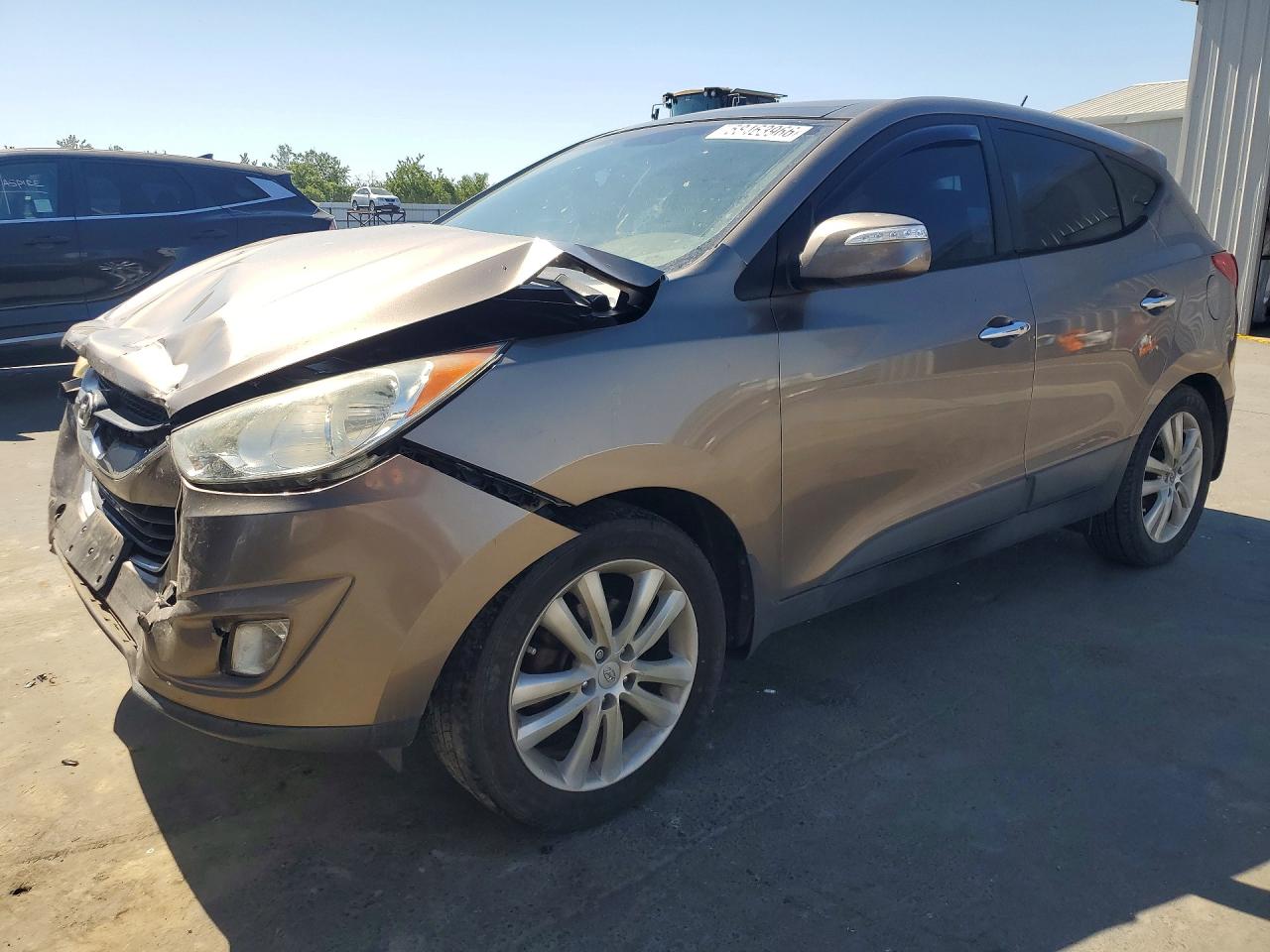 2013 Hyundai Tucson Limited Tan vin: KM8JU3AC7DU695705