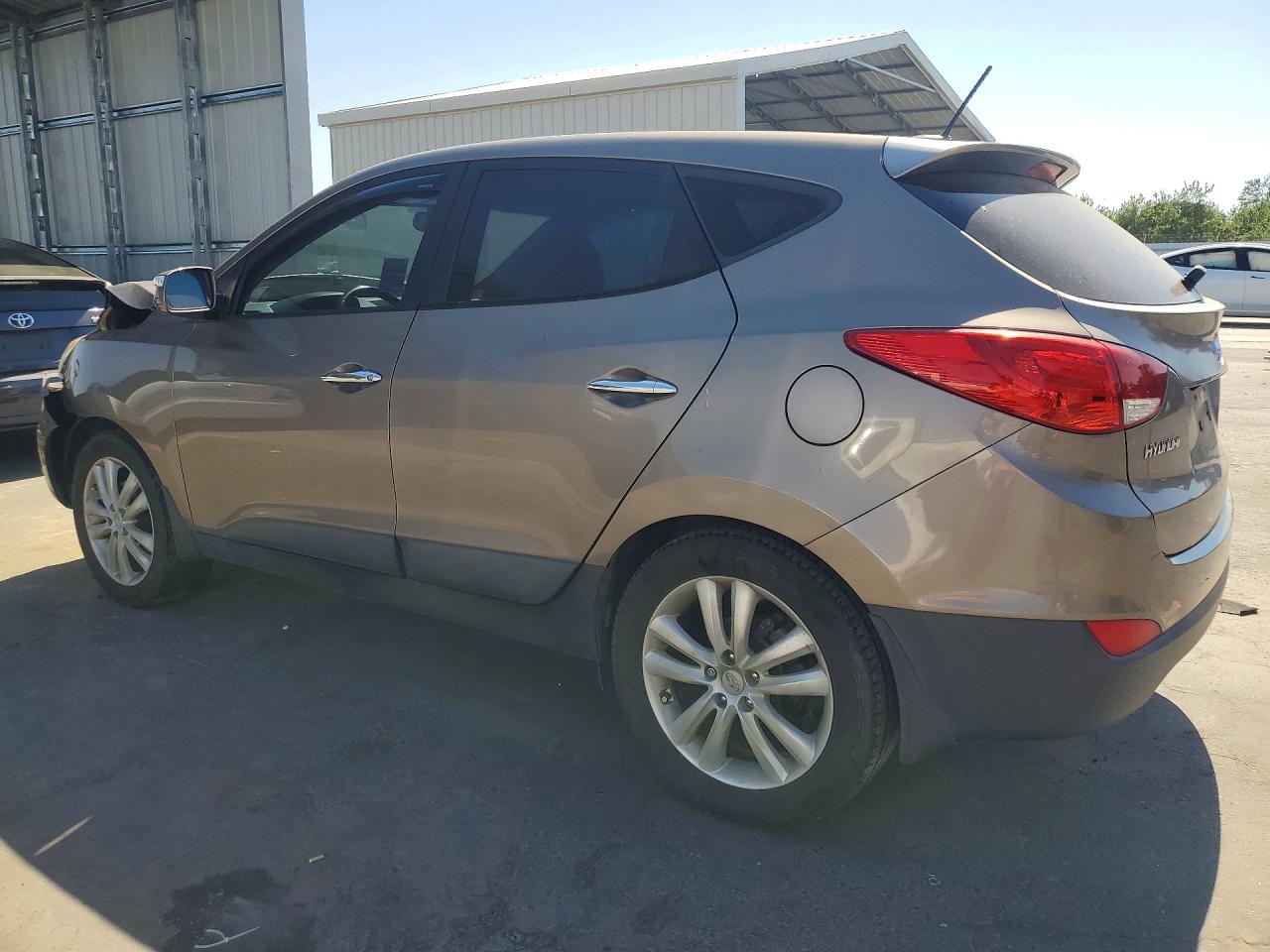 2013 Hyundai Tucson Limited Tan vin: KM8JU3AC7DU695705
