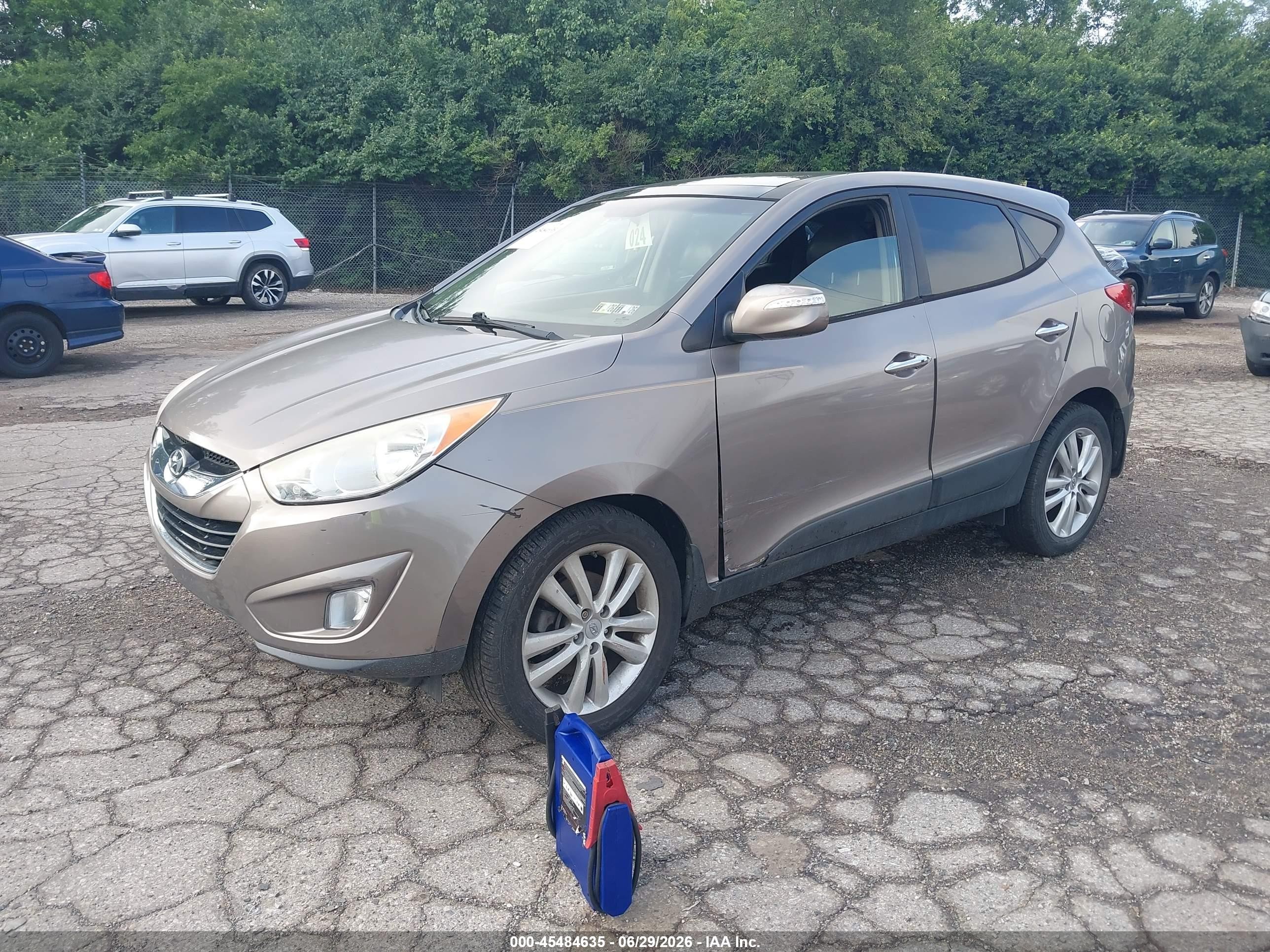 2013 Hyundai Tucson Limited Tan vin: KM8JU3AC8DU565870