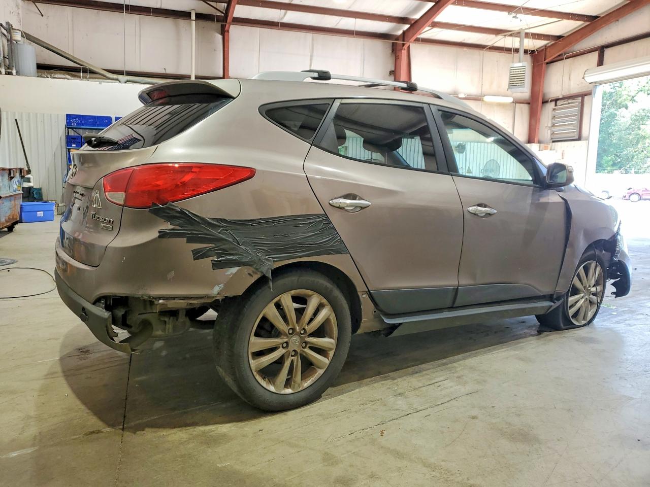 2012 Hyundai Tucson Limited Tan vin: KM8JU3AC9CU384582