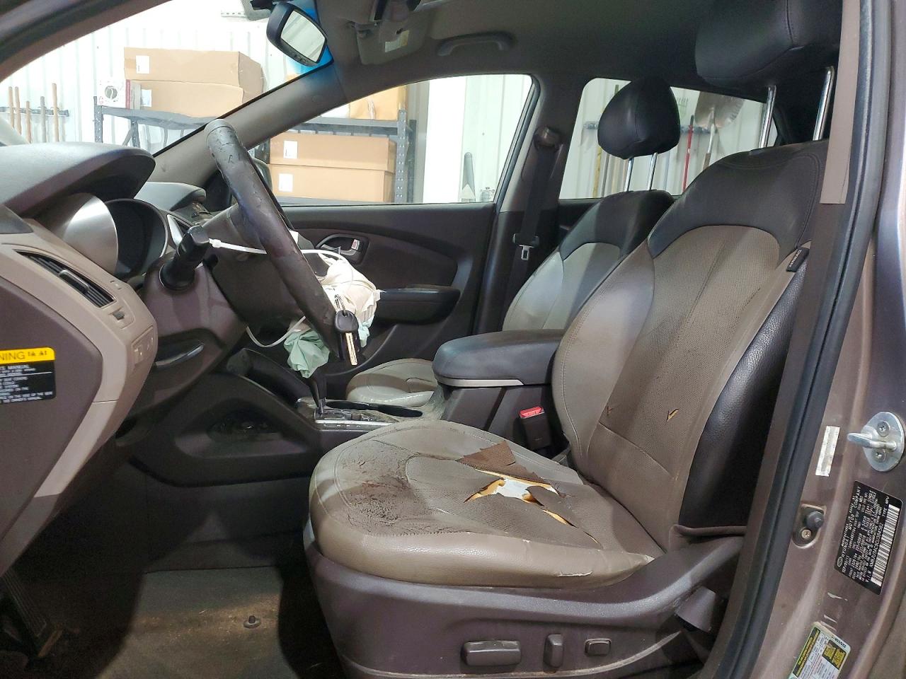 2012 Hyundai Tucson Limited Tan vin: KM8JU3AC9CU384582