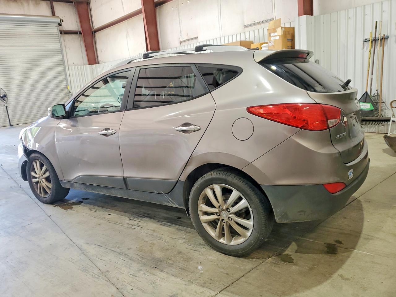 2012 Hyundai Tucson Limited Tan vin: KM8JU3AC9CU384582