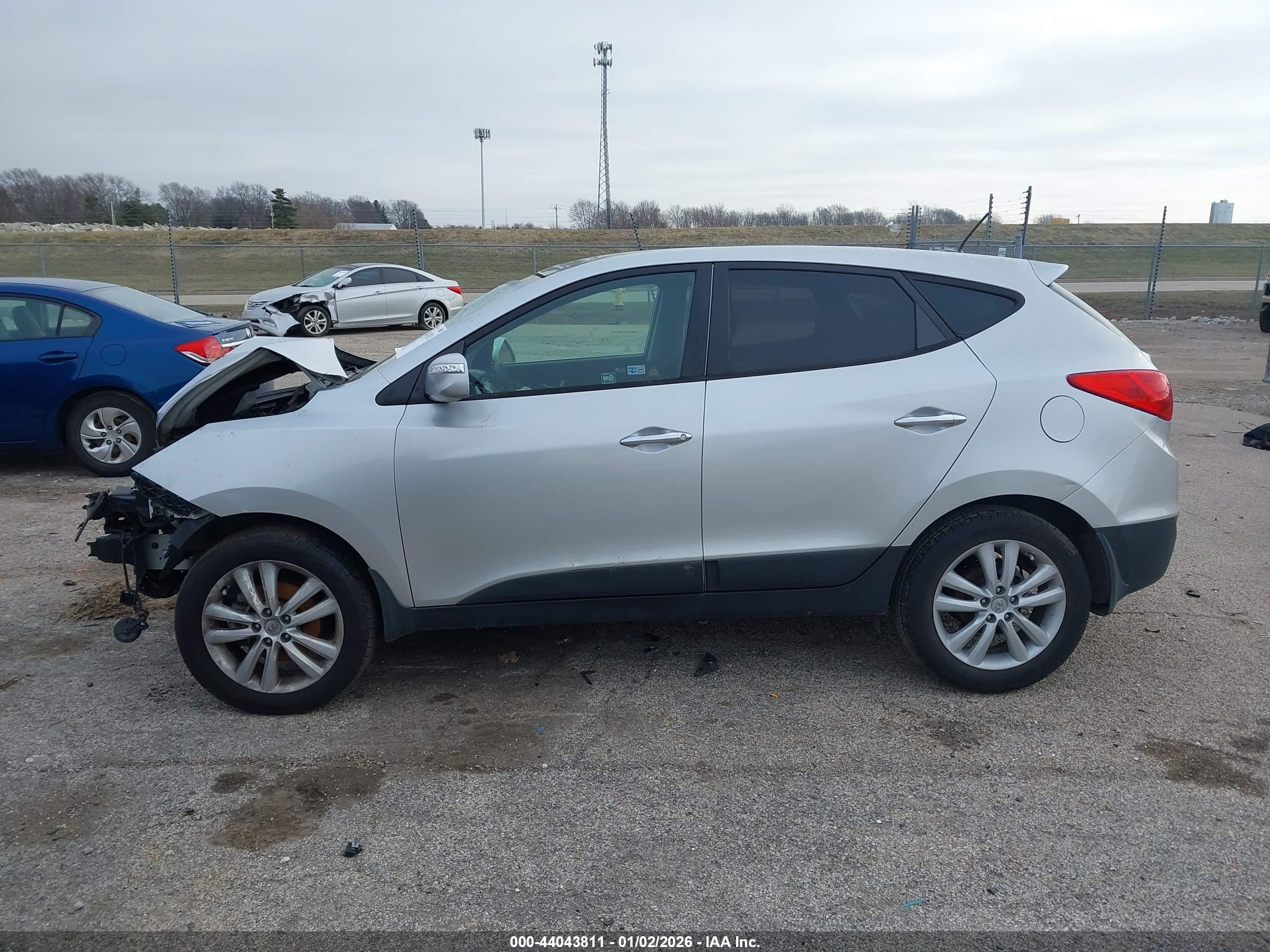 2012 Hyundai Tucson Limited Silver vin: KM8JU3AC9CU404006