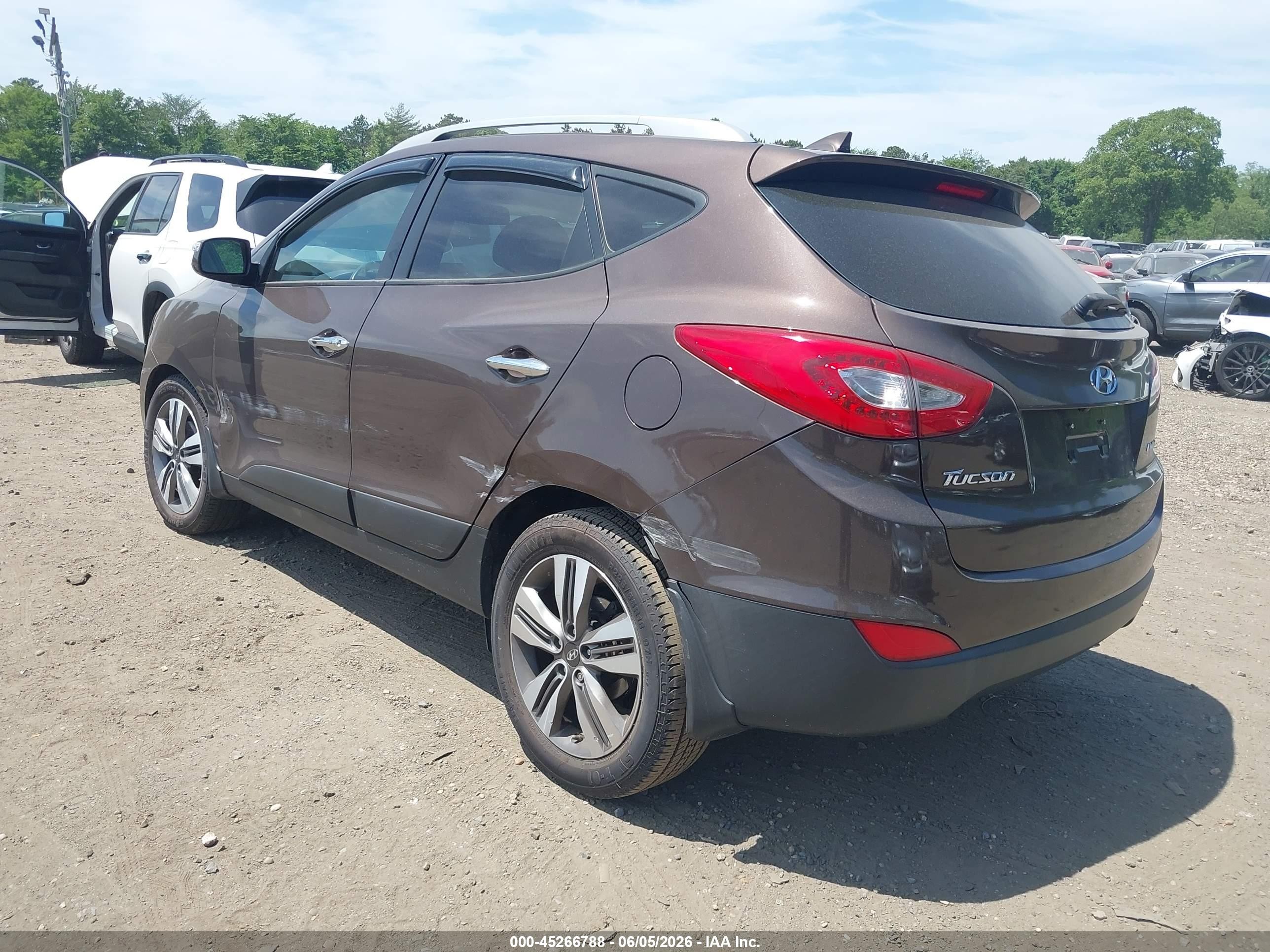 2015 Hyundai Tucson Limited Коричневый vin: KM8JU3AG7FU961780