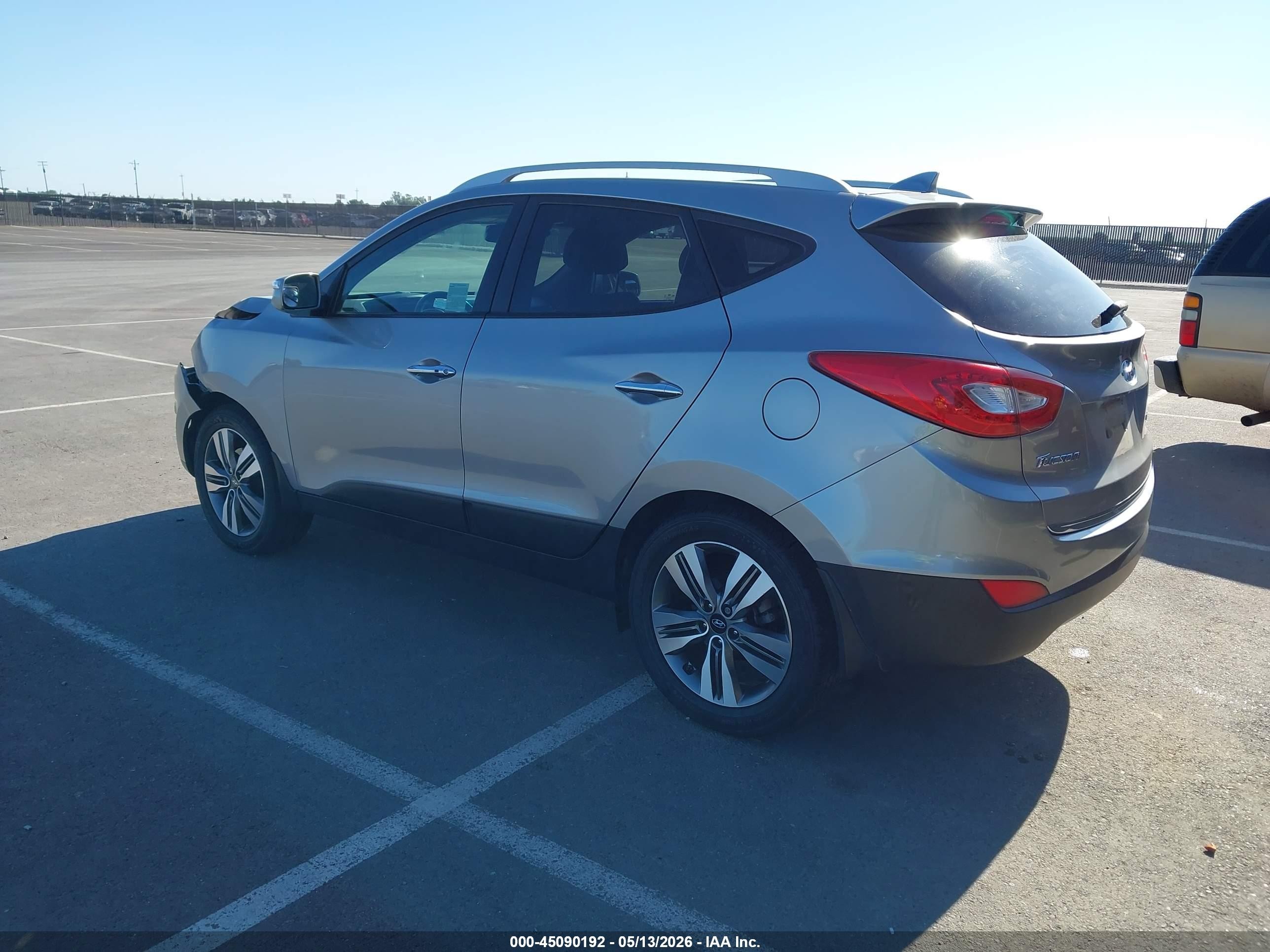 2014 Hyundai Tucson Limited Серебряный vin: KM8JU3AG9EU945711